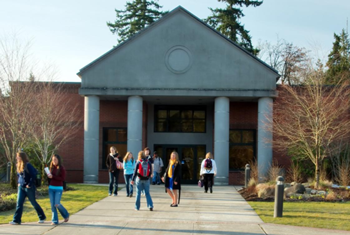 Pierce College District Photo - Students gather outside the Gaspard Building on the Puyallup Campus.