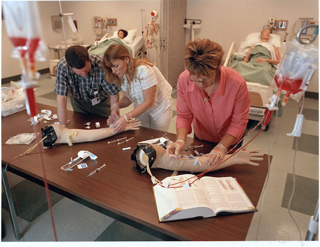 Maine College of Health Professions Photo - two students learning how to do IV's