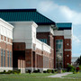 John Wood Community College Photo #2 - Heath Fine Arts Center. Art, music, graphic design, choral and instrumental performing groups, exhibit hall, 300 seat auditorium, private music lesson halls, piano lab, green room and classrooms.